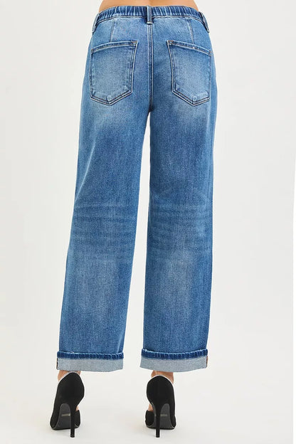 Risen elastic band slouch ankle boyfriend jeans with cuffed hem, casual fit, and distressed details, shown on a model.