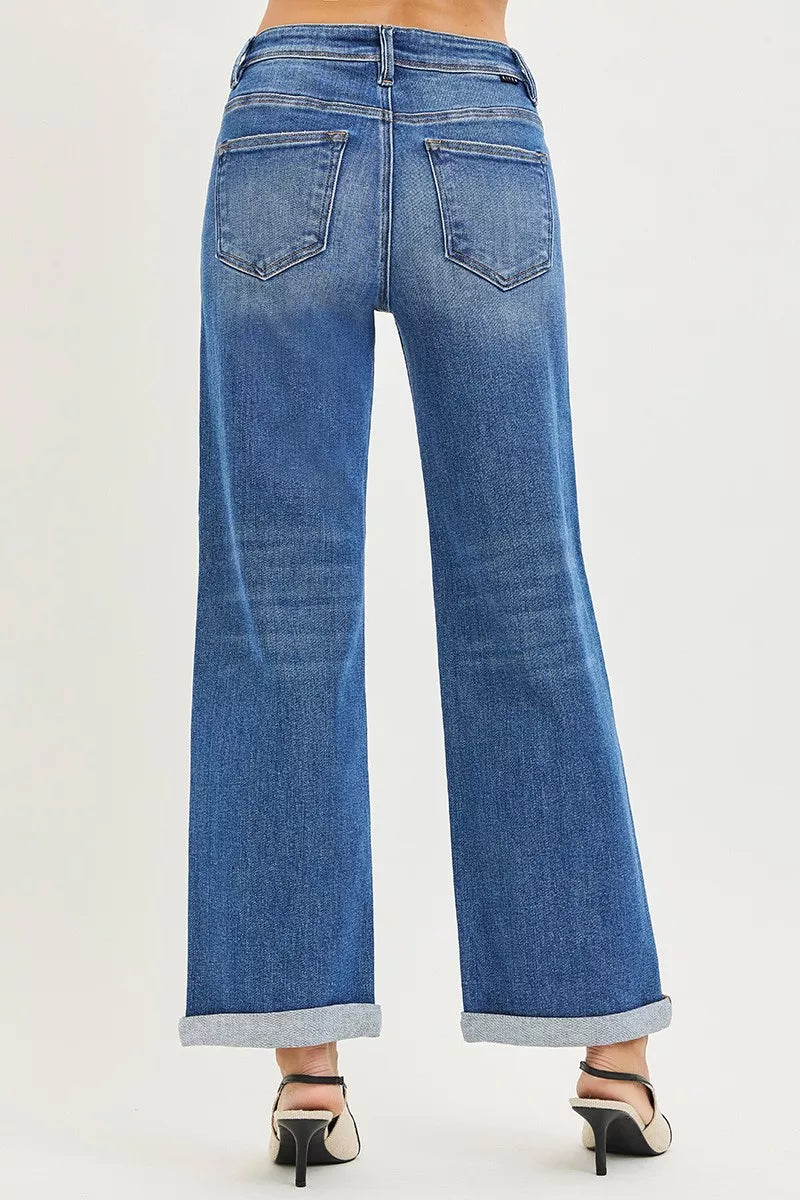 Plus size RISEN high-rise relaxed fit ankle cuff jeans by Trendsi, showing the straight-leg style and cuffed hem.