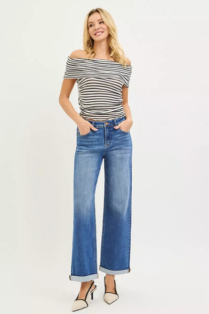 Plus size Risen high-rise relaxed fit ankle straight cuff jeans by Trendsi, showing the denim's fit and cuff detail.