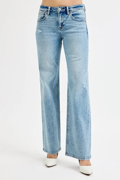 Risen full size low rise ankle boyfriend distressed jeans in plus size, featuring a relaxed fit and ripped details.