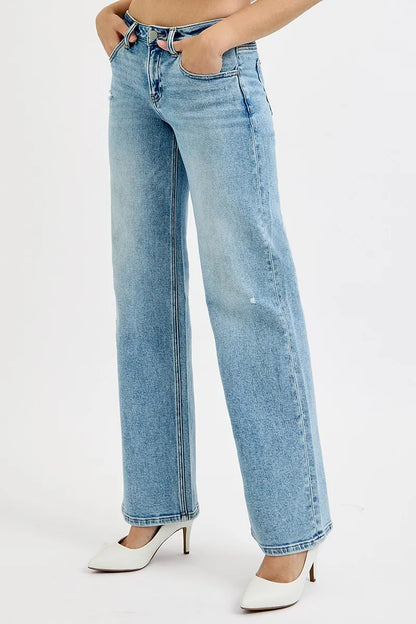 Risen full-size low-rise ankle boyfriend distressed jeans in plus size, featuring a relaxed fit and ripped details.