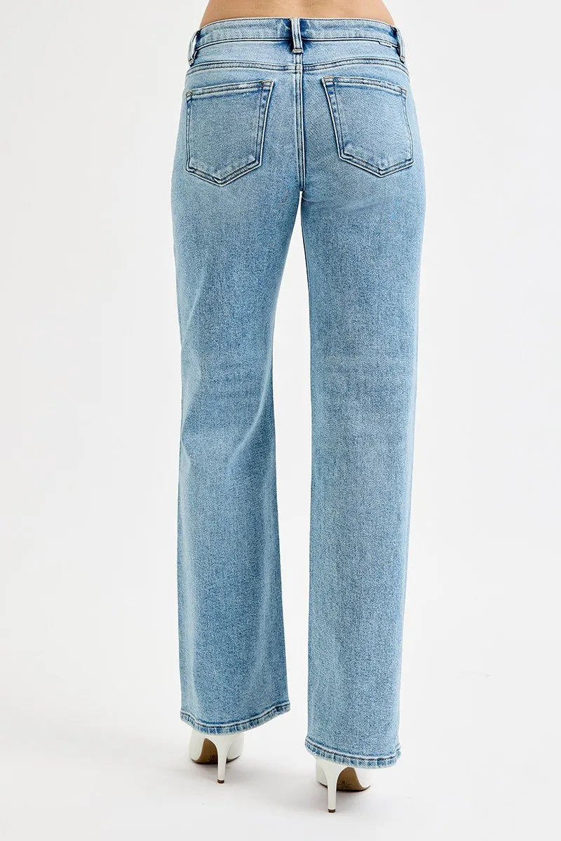 Plus size Risen low-rise ankle boyfriend distressed jeans from Trendsi, showcasing relaxed fit and ripped details.