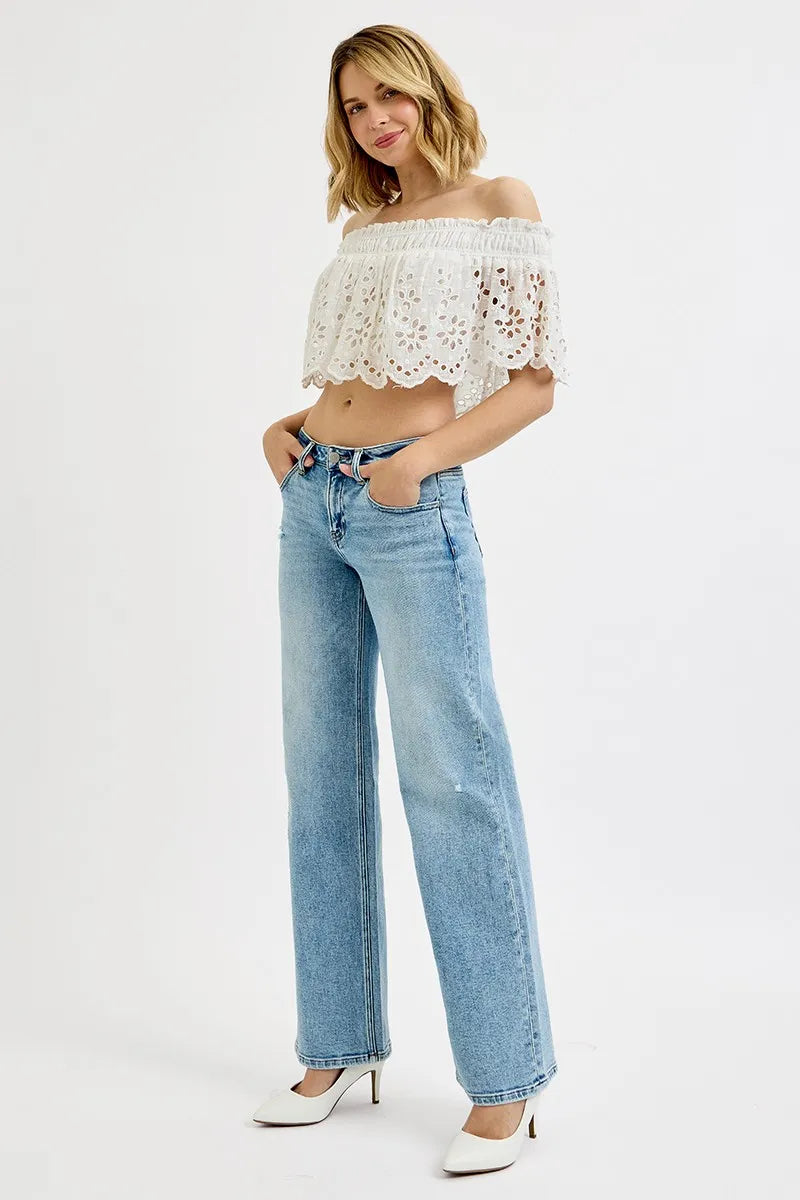Plus size RISEN low rise ankle boyfriend distressed jeans from Trendsi, featuring a relaxed fit and ripped detailing.