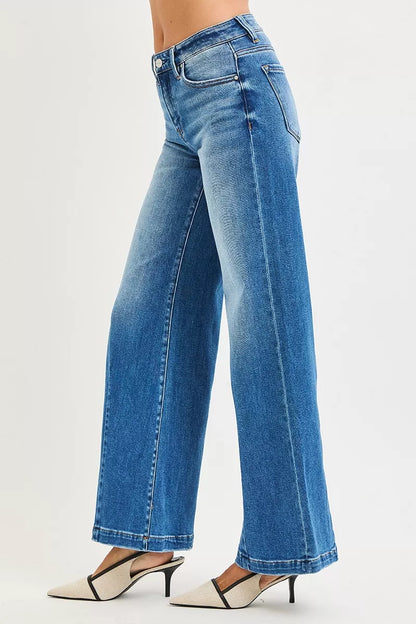 Plus size RISEN mid-rise wide leg jeans with flared look, stylish and comfortable fashion denim by Trendsi.
