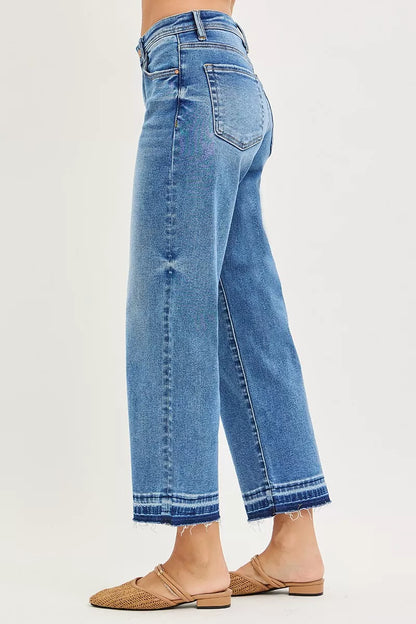 Plus size RISEN slouchy cropped boyfriend jeans from Trendsi, shown in a relaxed fit with distressed details and casual style.