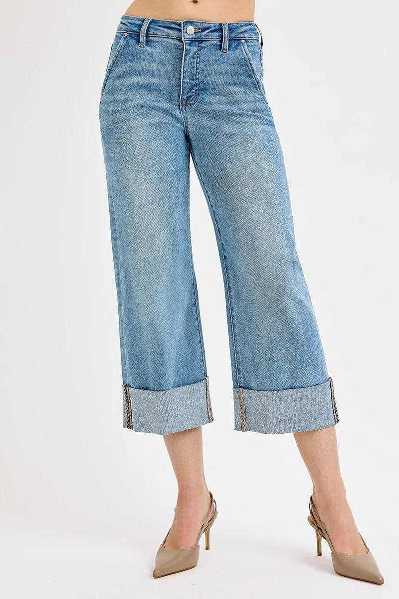 Plus size RISEN high-rise ankle wide-cuffed jeans with tummy control, made by Trendsi, shown with a fitted waist and cuffed hems.