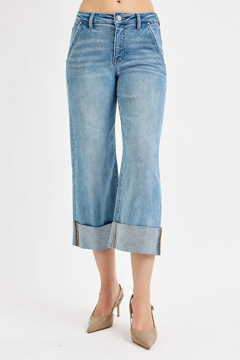 Plus size RISEN high-rise ankle wide-cuffed jeans with tummy control, featuring a relaxed fit and trendy design.