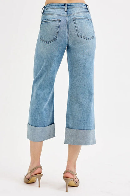 Plus size high-rise ankle jeans with wide cuffs from RISEN, featuring tummy control and a trendy fit, by Trendsi.