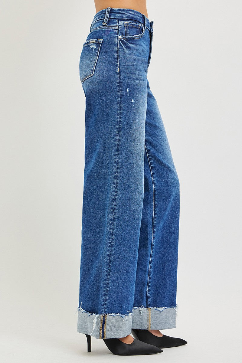 High-rise wide-leg jeans with cuffed hem from Trendsi, showcasing a relaxed fit and stylish denim design.