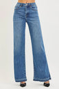 Risen high-rise wide-leg jeans with a released hem, featuring a stylish casual denim look from Trendsi.
