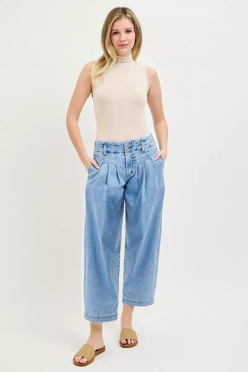 Risen slouchy crop barrel pleated jeans in light denim with relaxed fit, high waist, and stylish pleats, designed by Trendsi.