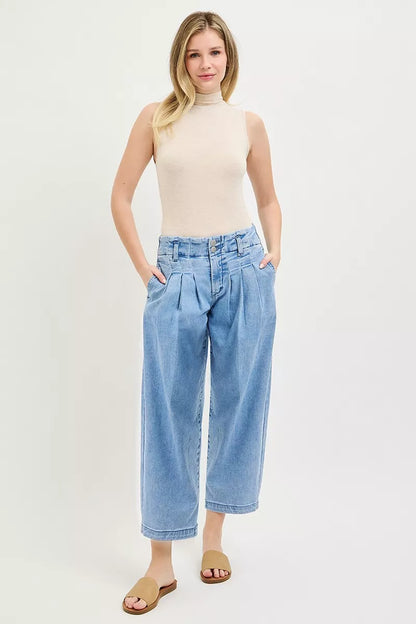 Risen slouchy crop barrel pleated jeans in light denim with relaxed fit, high waist, and stylish pleats, designed by Trendsi.