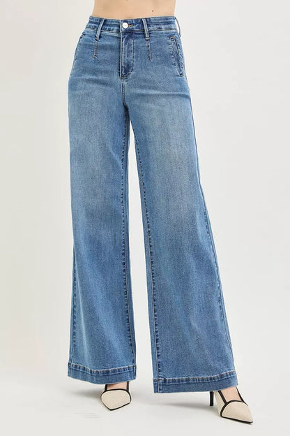 High-rise wide jeans with tummy control elastic band by Risen, featuring a trendy fit and durable denim material.
