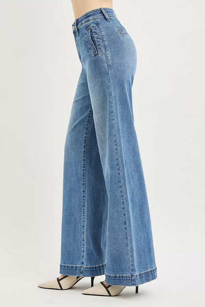 Trendsi RISEN high-rise wide jeans with tummy control elastic band, showcasing a relaxed fit and denim texture.