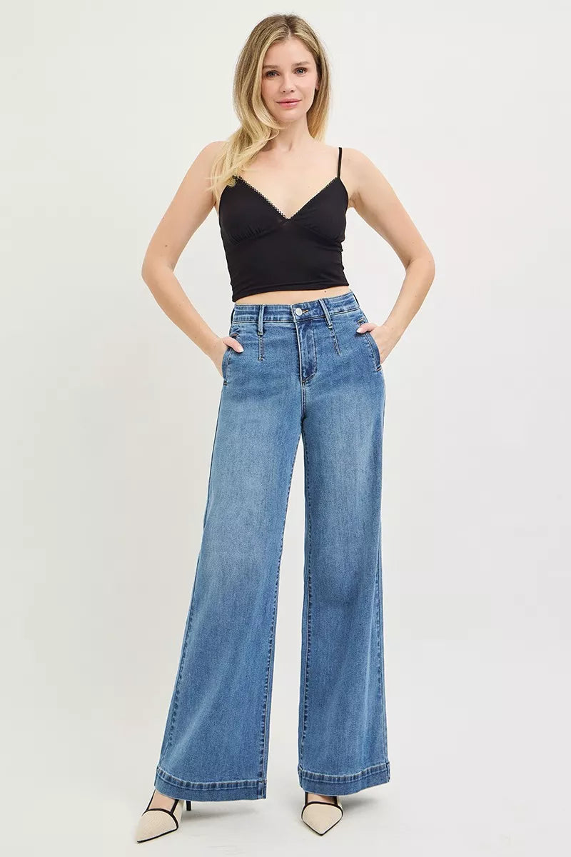 High-rise wide jeans with tummy control elastic band by Risen, featuring a trendy fit and durable denim from Trendsi.
