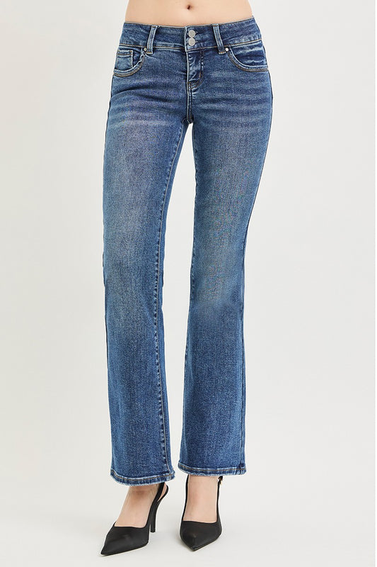 Risen Tummy Control Low Rise Bootcut Jeans by Trendsi showing mid-rise fit, classic denim, and bootcut style on a model.