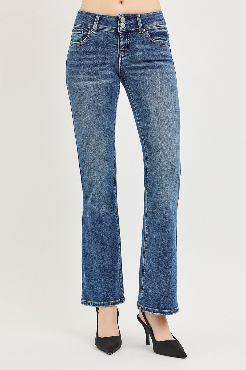 Medium shot of Risen Tummy Control Low Rise Bootcut Jeans by Trendsi, showing fit, denim fabric, and classic bootcut style.