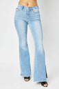 Judy Blue full-size mid-rise raw hem slit flare jeans with distressed details, shown on a model.