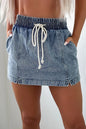 Drawstring high waist denim shorts with pockets, styled by Trendsi, featuring a casual, comfortable fit and trendy design.