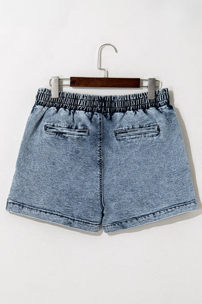 Drawstring high waist denim shorts with pockets, featured by Trendsi, showcasing a casual, stylish look with a relaxed fit.