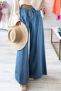 Light blue drawstring elastic waist wide-leg jeans by Trendsi, showing relaxed fit and casual style.