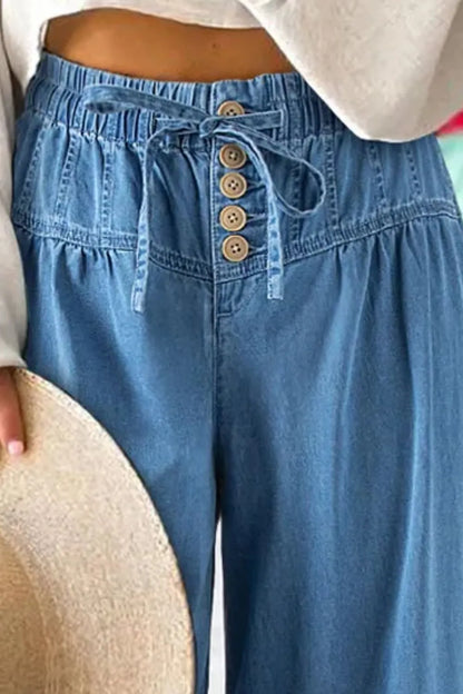 Trendsi drawstring elastic waist wide-leg jeans shown in medium size with relaxed fit, featuring a comfortable high-rise style.
