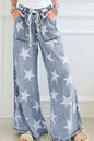 Star print washed high waist wide-leg jeans with drawstring from Trendsi, shown on a model.