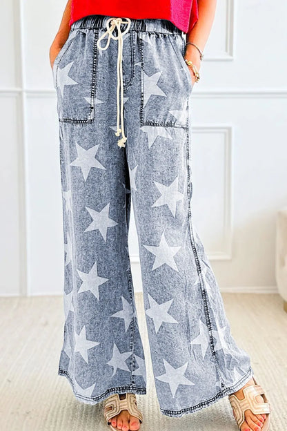 Star print washed high waist wide-leg jeans with drawstring, trendy casual denim from Trendsi, shown on a model.