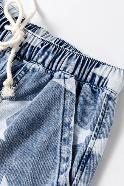 Star print washed high waist wide leg jeans by Trendsi with drawstring waistband and relaxed fit, showcasing the stylish denim design.