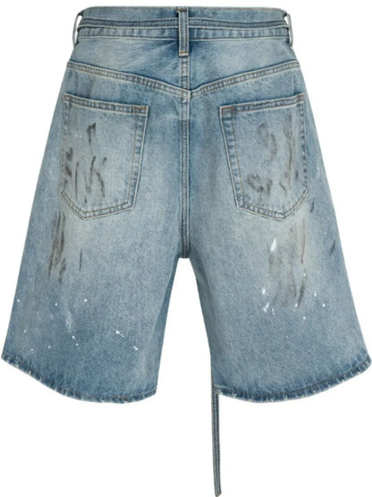Men's washed denim Bermuda shorts with graffiti print, casual men's fashion shorts by Trendsi, shown on a model.