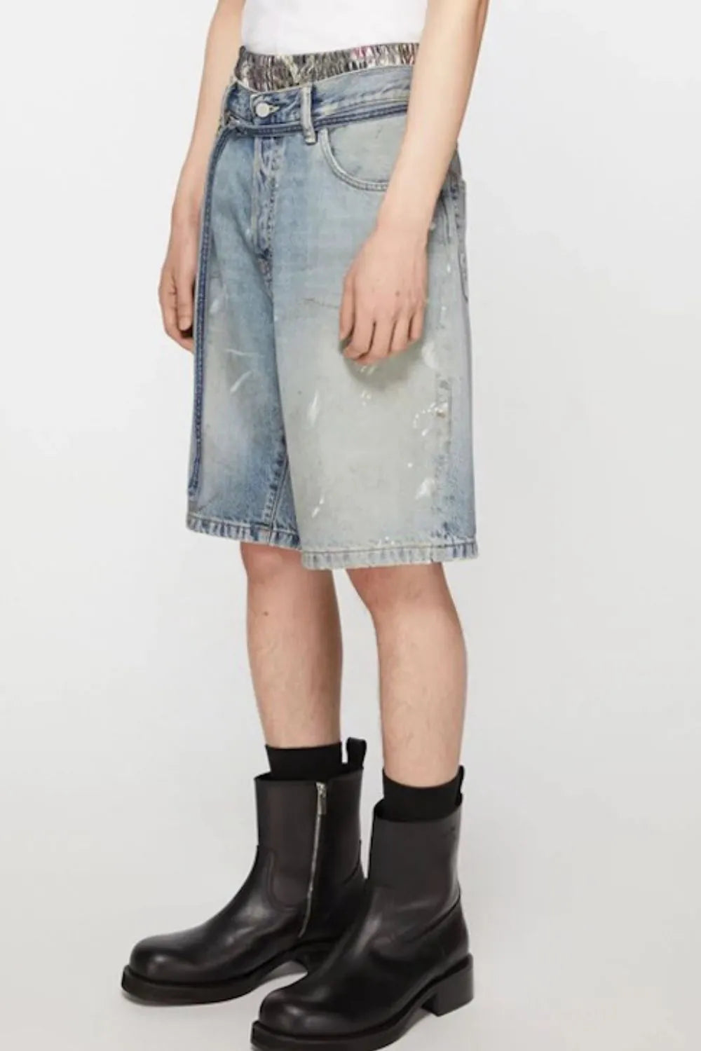 Men's washed denim Bermuda shorts with graffiti print from Trendsi, featuring a casual, distressed look and knee-length design.