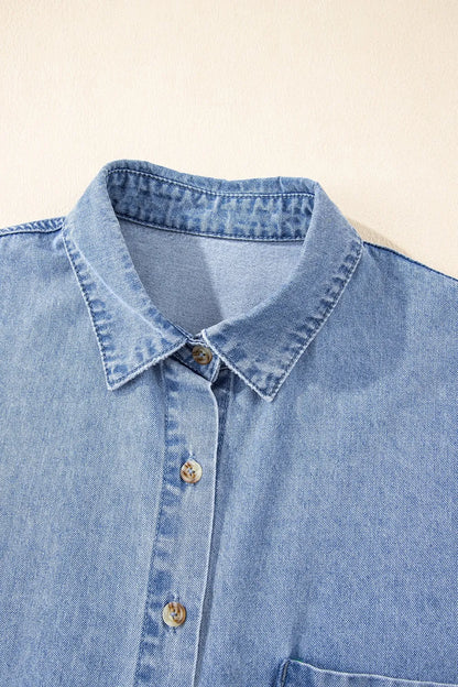 Medium-length button down short sleeve denim dress by Trendsi, featuring classic denim fabric and a stylish casual fit.