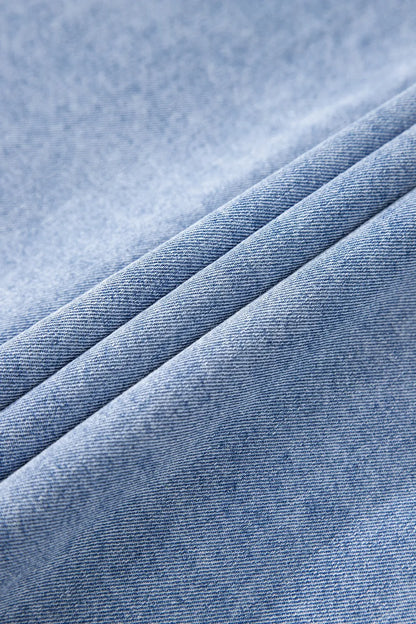 Medium-length button-down short sleeve denim dress by Trendsi, featuring classic denim fabric and a casual, stylish fit.
