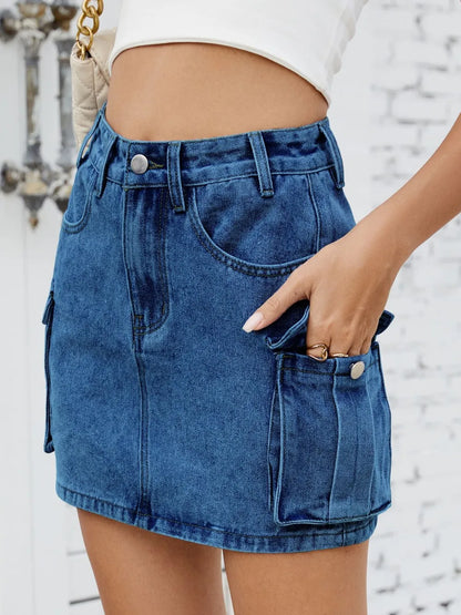 Medium-length denim cargo skirt by Trendsi featuring multiple pockets and a relaxed fit, perfect for casual wear.