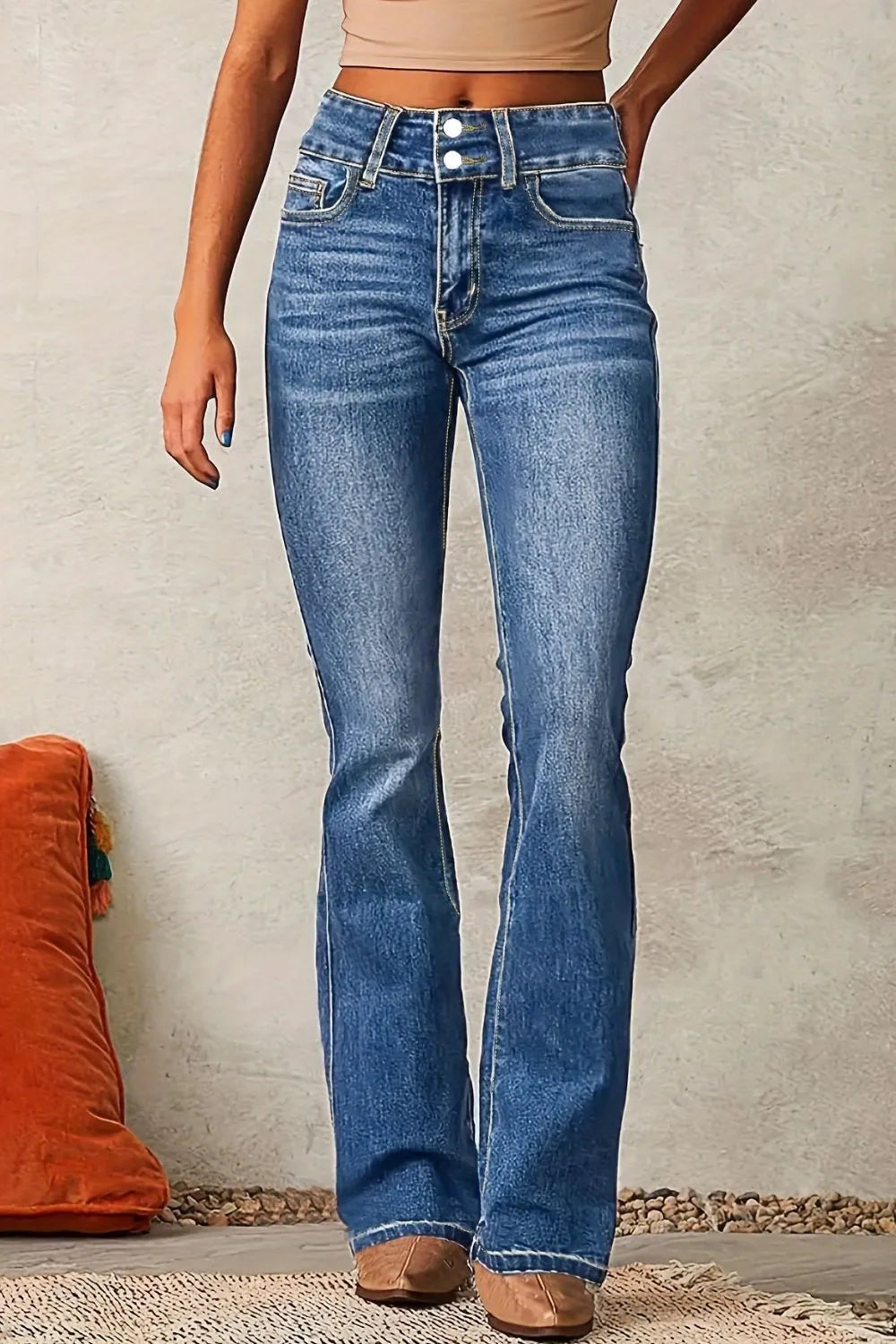 Medium wash Cat Whisker Washed Bootcut Jeans by Trendsi showing the relaxed fit and classic bootcut style on a model.