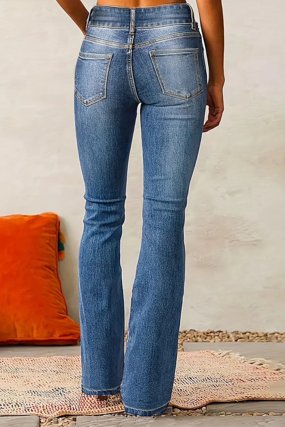 Medium wash Cat Whisker Washed Bootcut Jeans from Trendsi, showing the relaxed fit, classic pockets, and stylish denim details.