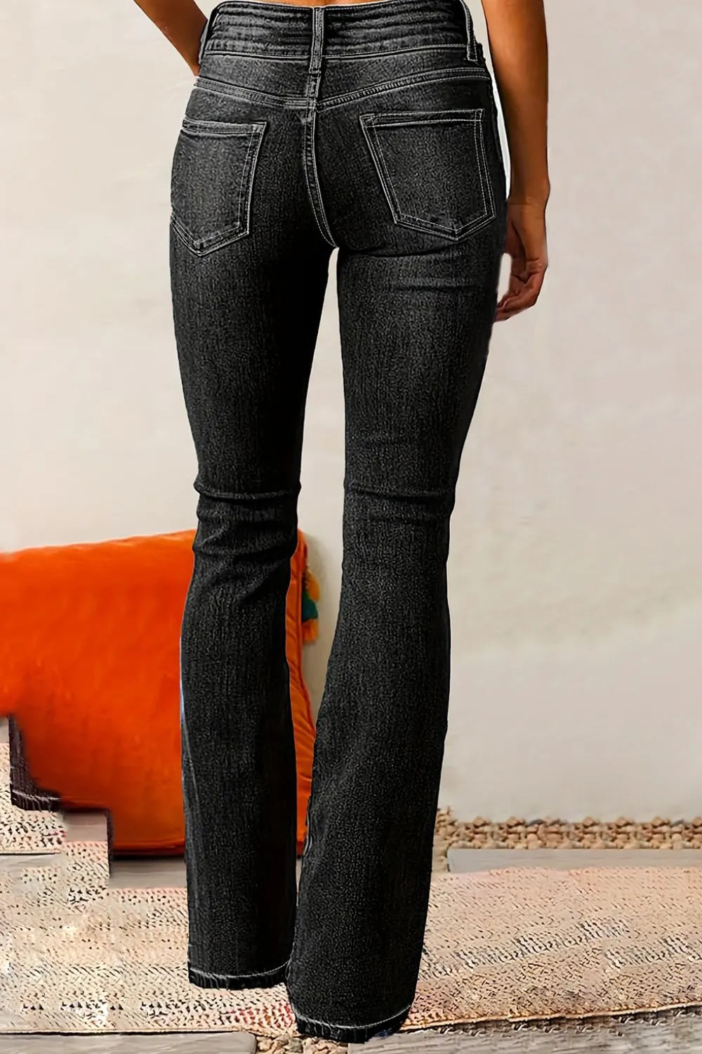 Medium wash Cat Whisker Washed Bootcut Jeans by Trendsi, showing relaxed fit, classic denim style, and bootcut leg silhouette.
