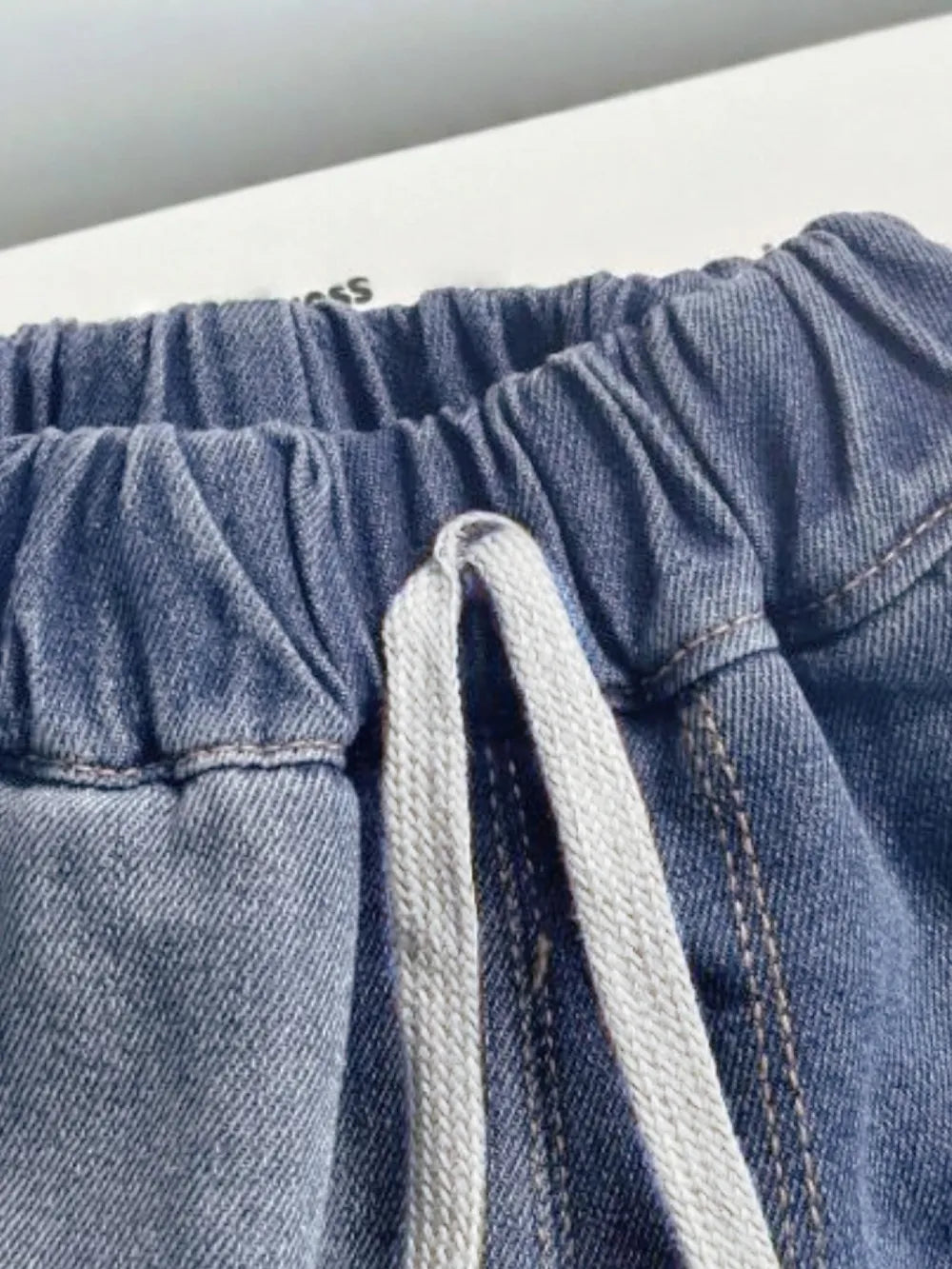 Trendsi denim set with collared neck button-up top and matching shorts, casual summer fashion, light blue denim fabric.