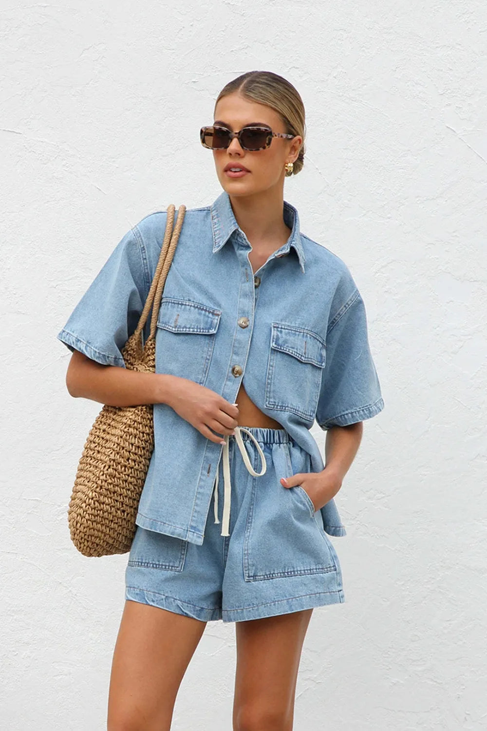 Trendsi denim set with collared neck button-up top and matching shorts, stylish casual summer outfit in light denim fabric.