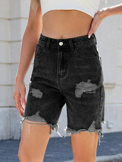 Medium-length distressed raw hem denim shorts from Trendsi featuring a casual fit and frayed edges.