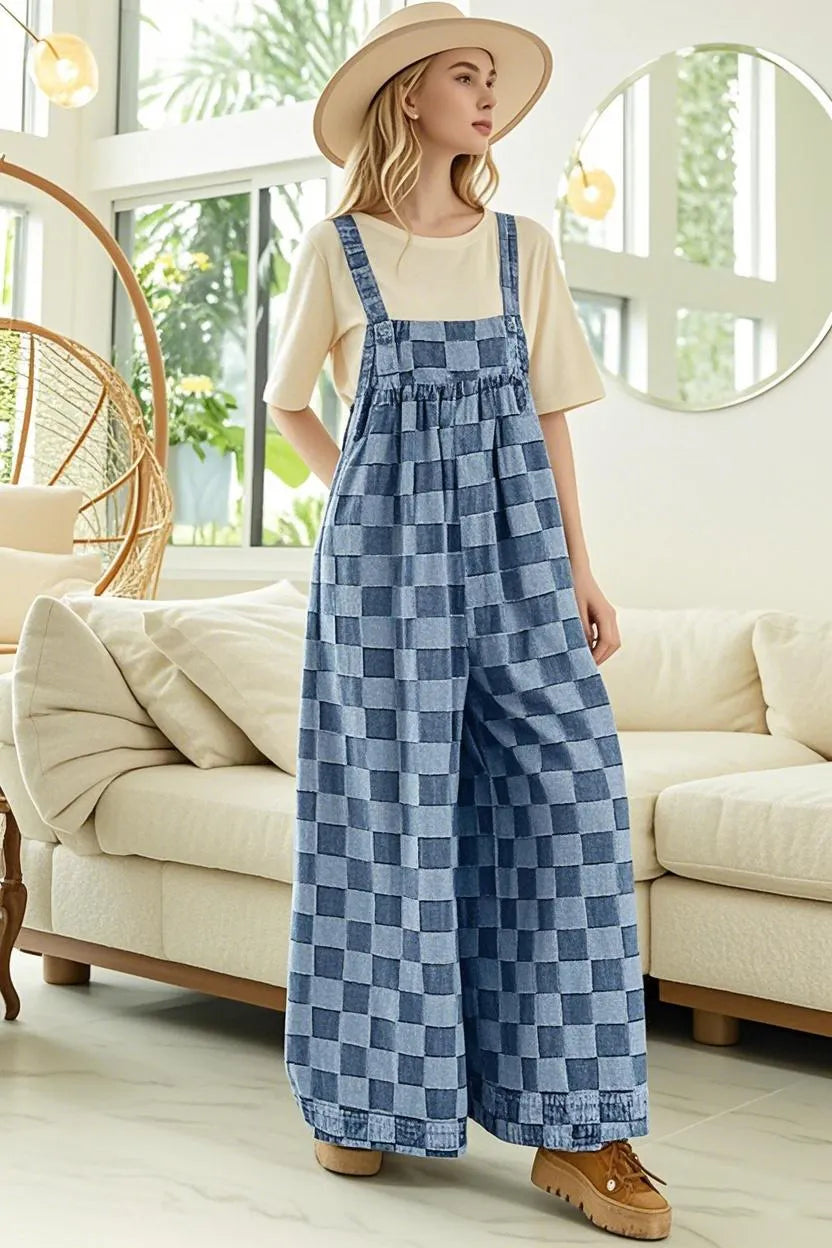 Checkered sleeveless denim jumpsuit with wide-leg design by Trendsi, featuring a relaxed fit and stylish checkered pattern.