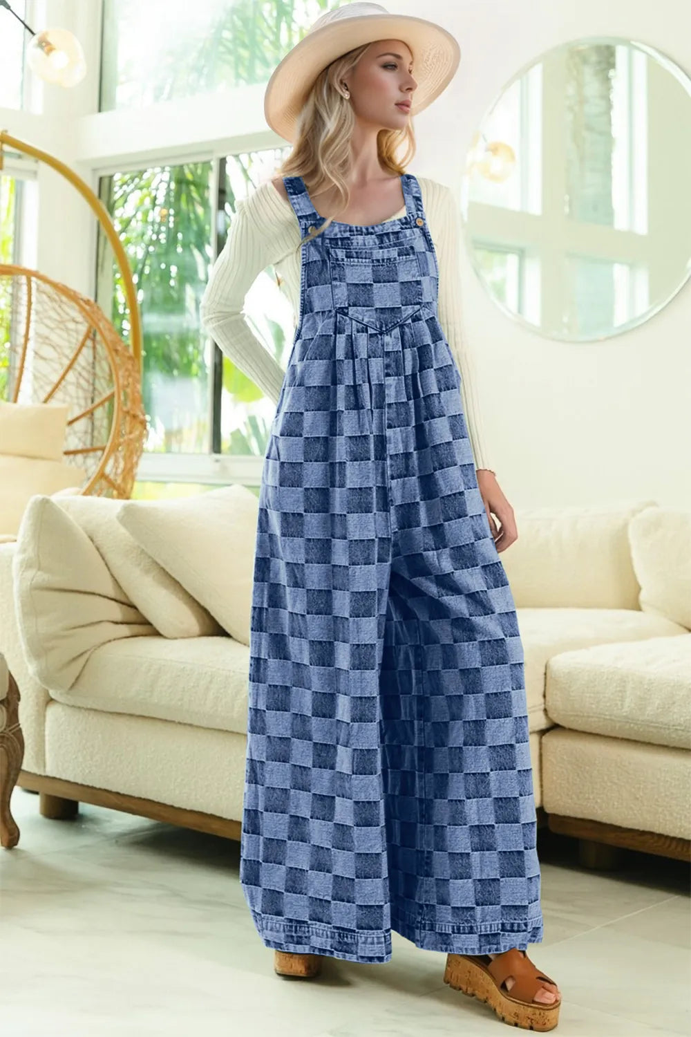 Checkered sleeveless denim jumpsuit with wide-leg design from Trendsi, featuring a stylish and comfortable fit.