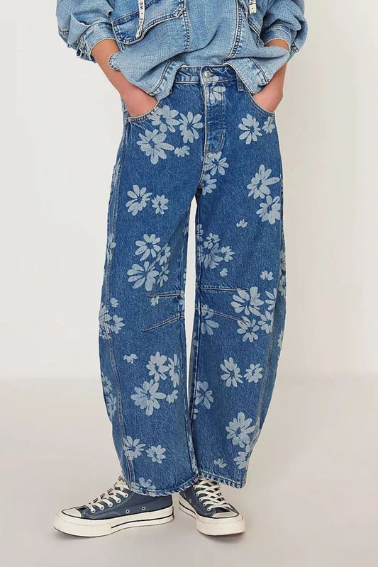 Flower print wide-leg jeans from Trendsi featuring a relaxed fit and floral pattern, shown in a medium size.