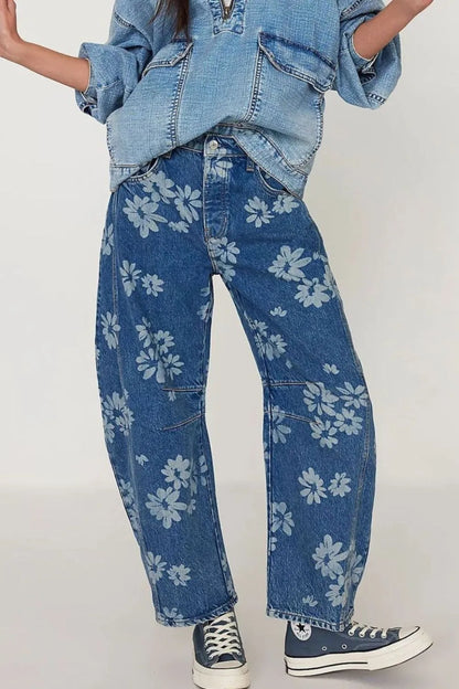 Flower print wide-leg jeans from Trendsi, featuring a relaxed fit with vibrant floral design and high-rise waist.