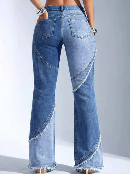 Medium wash frayed hem flare jeans by Trendsi featuring a stylish distressed hem and high-waisted fit.