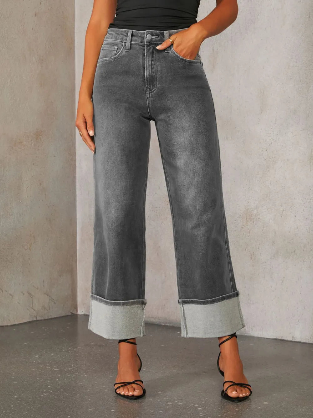 Medium shot of Trendsi high waisted straight leg rolled jeans showing fit and denim texture, styled on a model.
