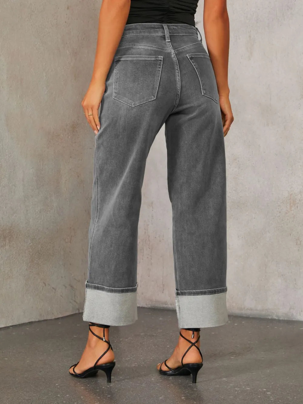 Medium shot of Trendsi high-waisted straight leg rolled jeans, showcasing the fit and classic denim style.