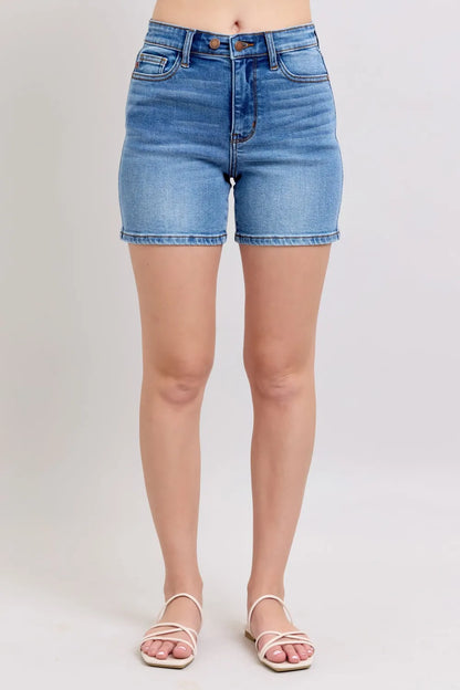 Plus size Judy Blue denim shorts with a 2-button front and pockets, featuring a stylish full-size fit.