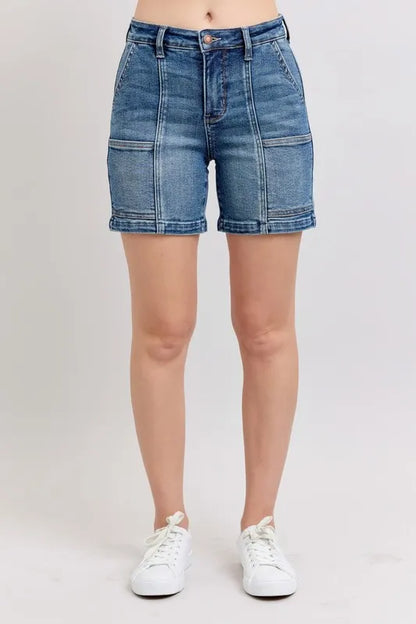 Plus size Judy Blue high rise denim shorts featuring a medium wash and classic five-pocket design, stylish and comfortable fit.