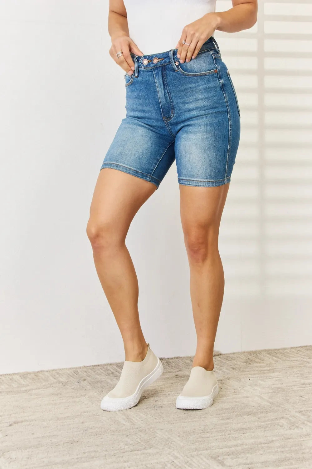 Judy Blue full-size denim Bermuda shorts with tummy control and double button front, in classic blue denim.